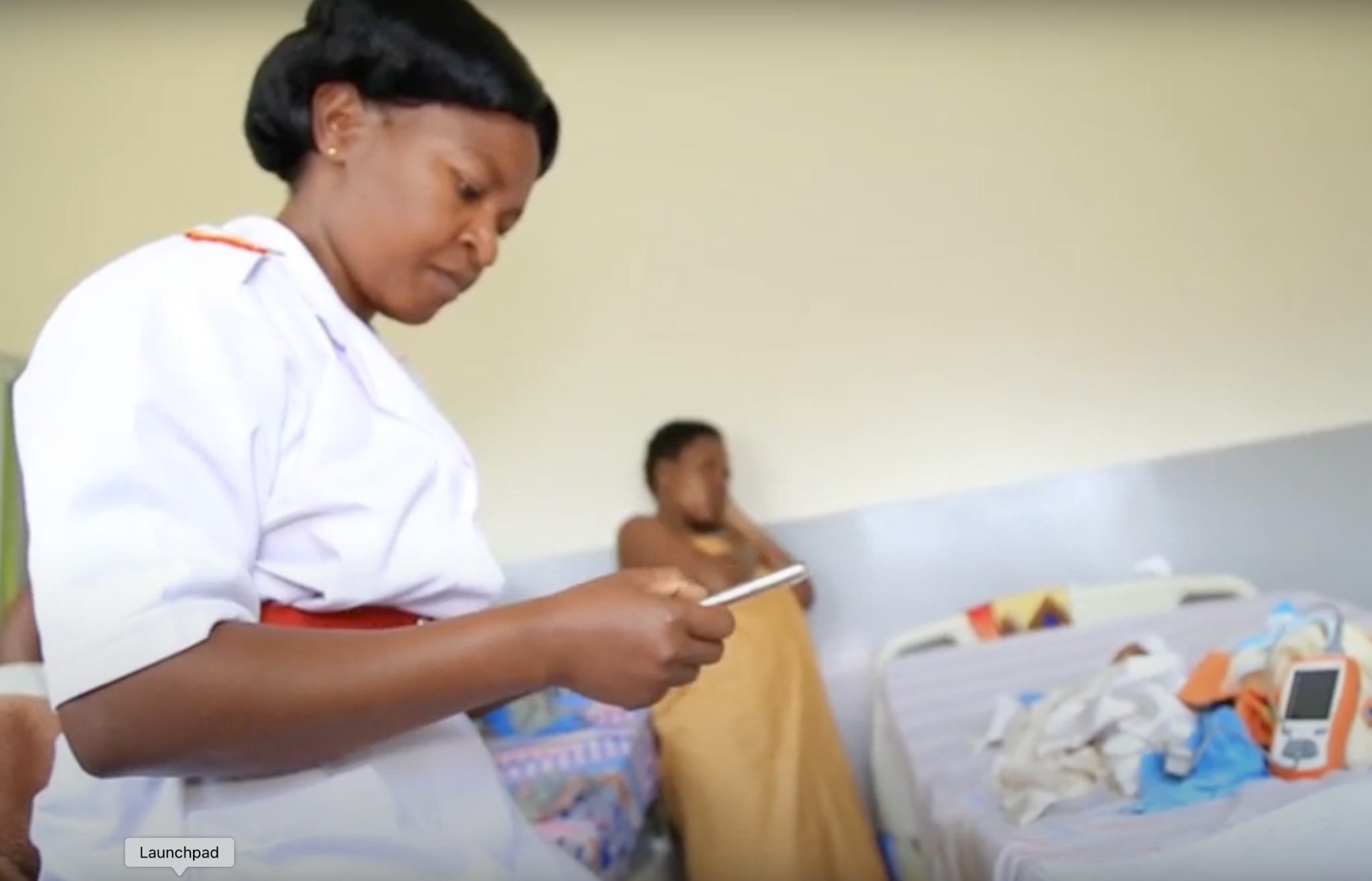 Frontline health worker using digital tools